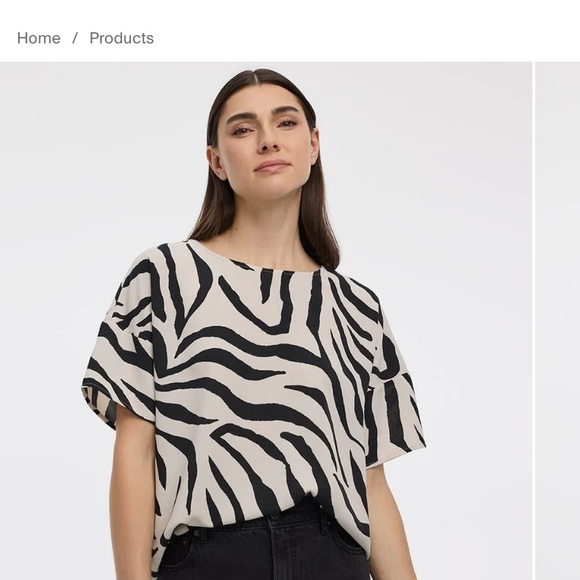 Reitmans Tops - NWOT Reitmans Woven Zebra-Print Short Sleeve Top in Black and Cream